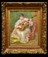 Woman Playing the Guitar